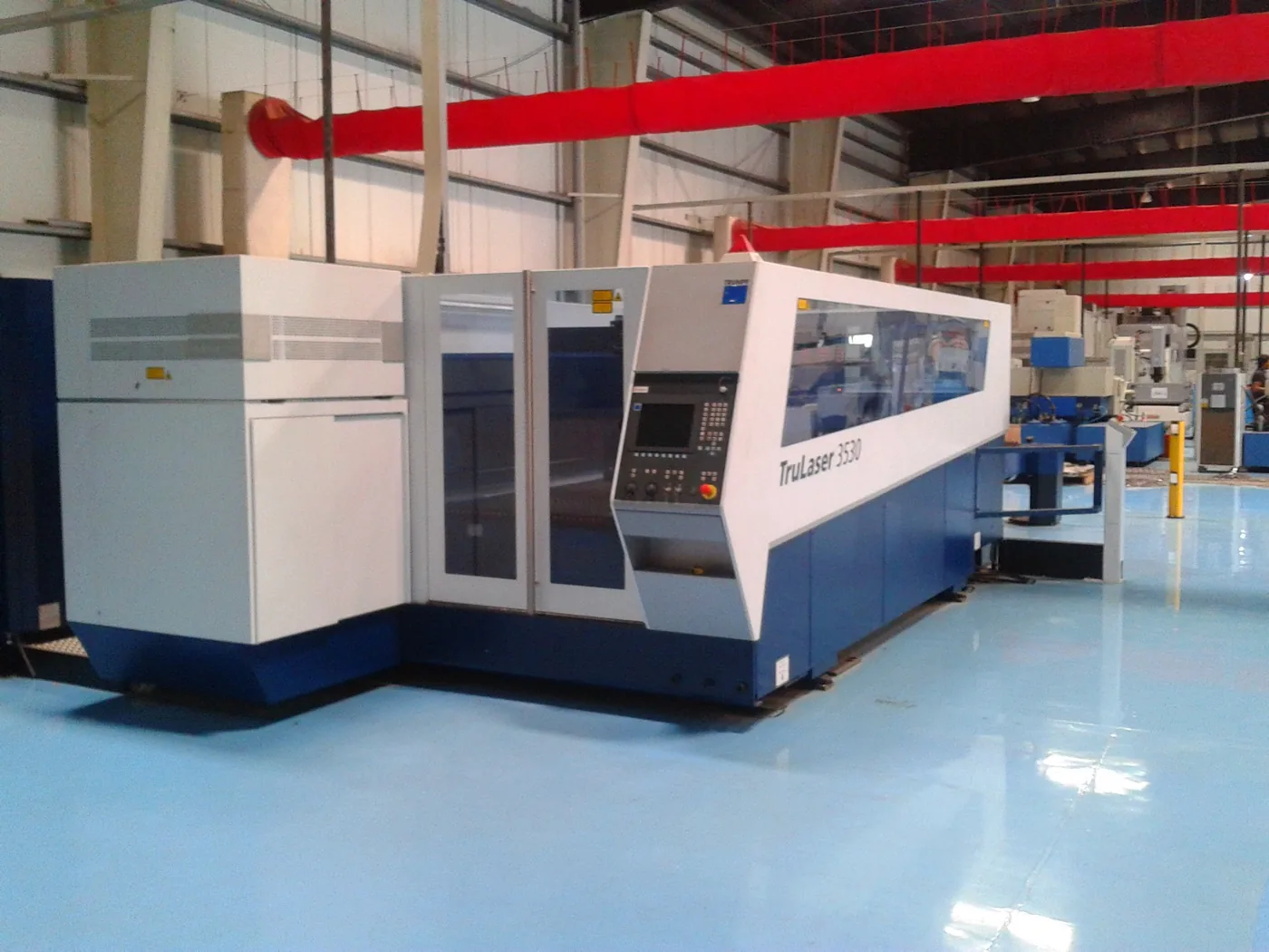 Real CNC machining center photographed in an industrial workshop
